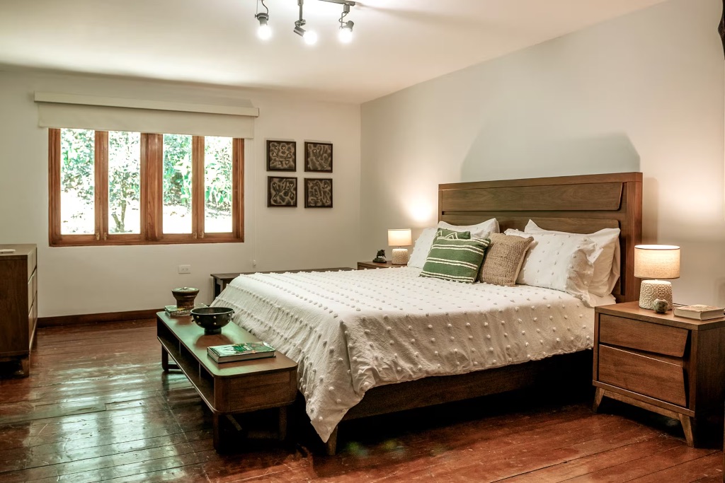 Elegant bedroom with wooden floors